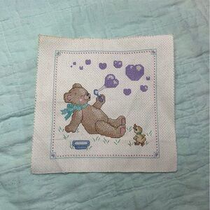 Vintage Cross-Stitch Bear Blowing Purple Bubbles